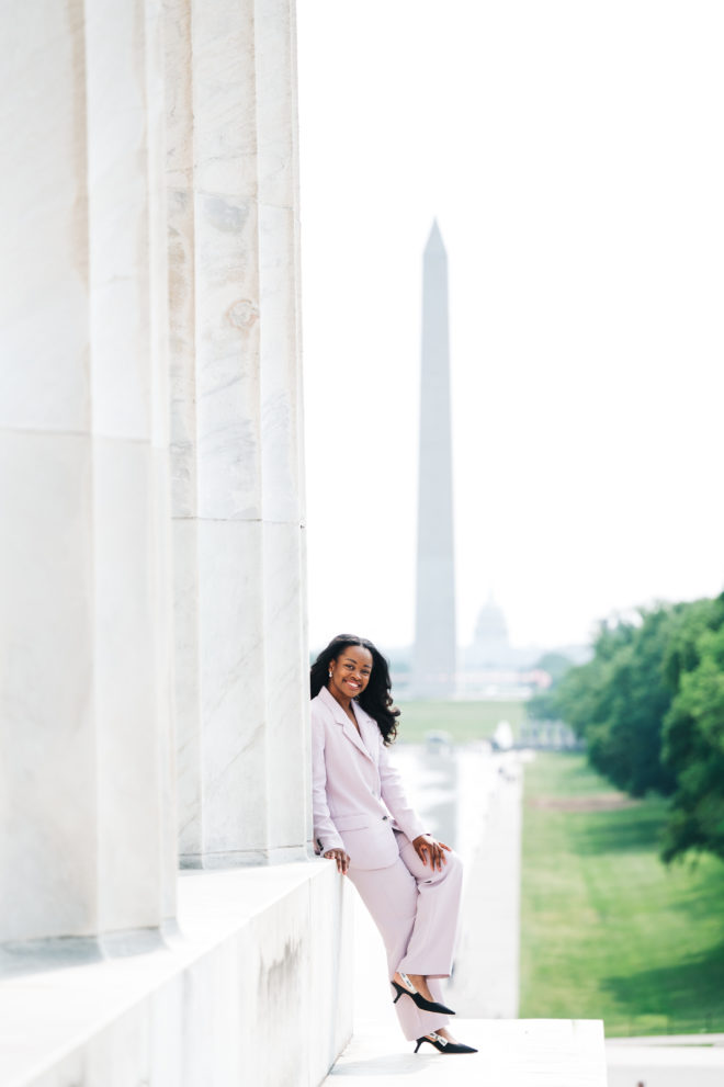 Photo of Michelle Aninye in front of the Washington Monument